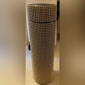Smart bottle dripping in diamond look-a-likes set in gold!!!